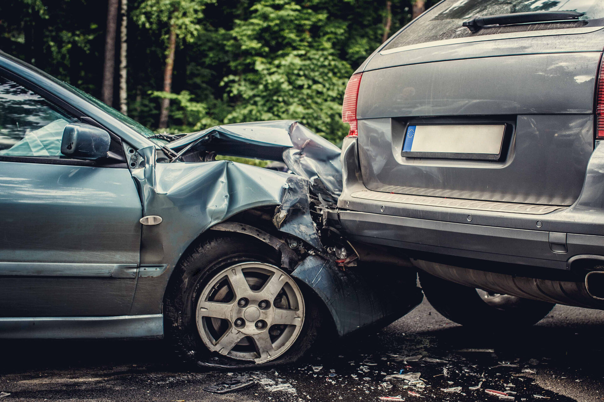 Car crash with front-end damage from rear-ending