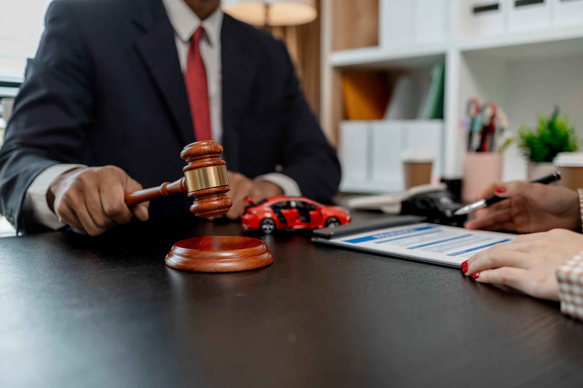 a lawyer is explaining the details of a car insurance