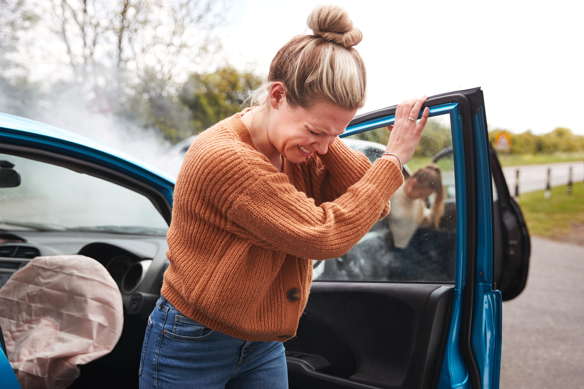 female driver in car accident