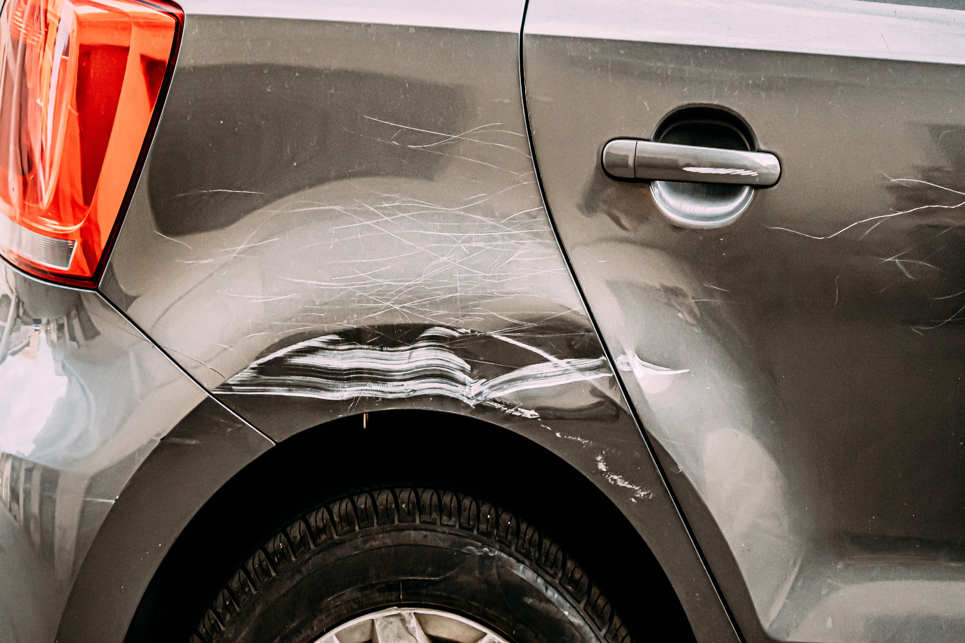 broken-scratched-bumper-luxury-car-scratched