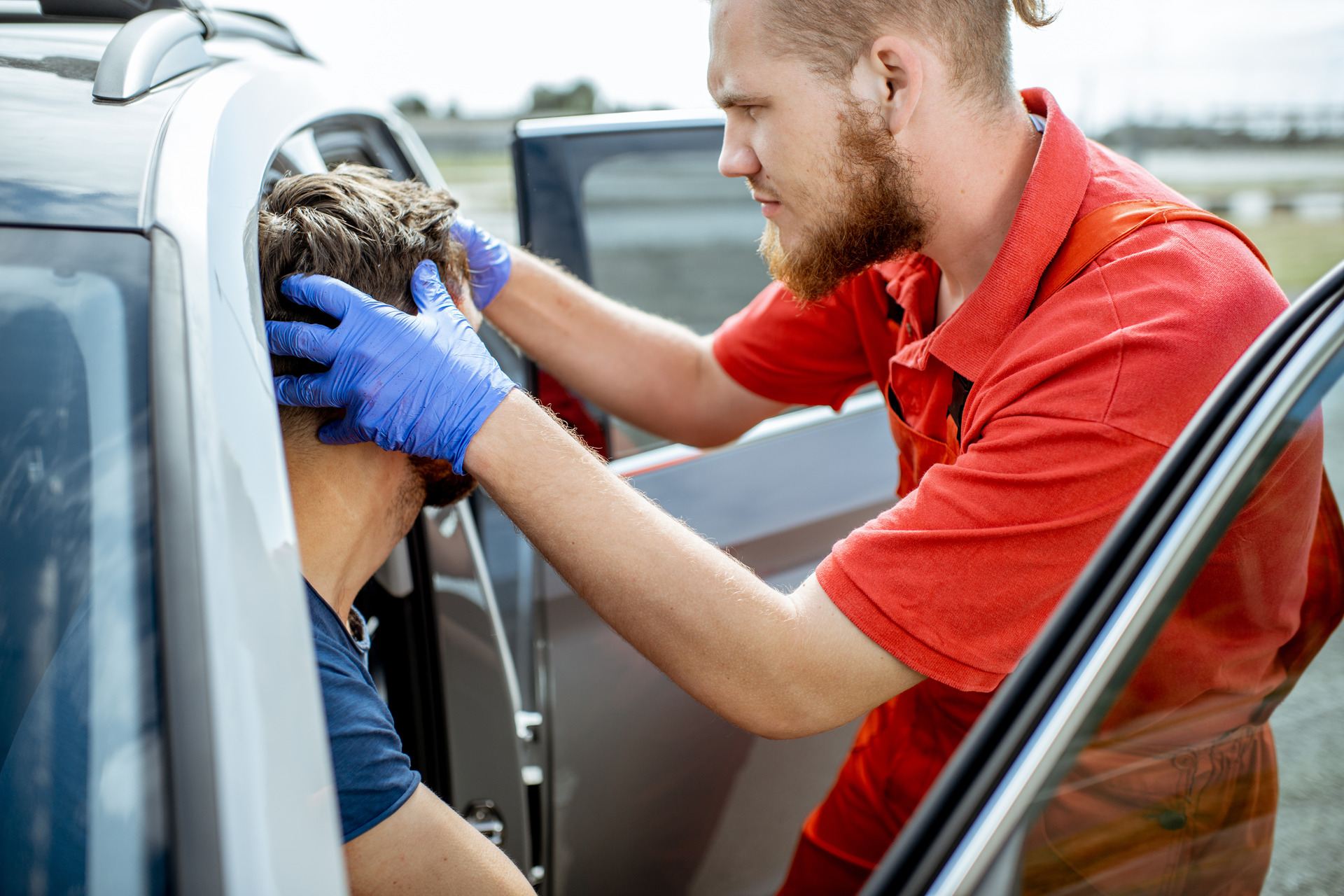 medic-examining-victim-after-hit-and-run-accident