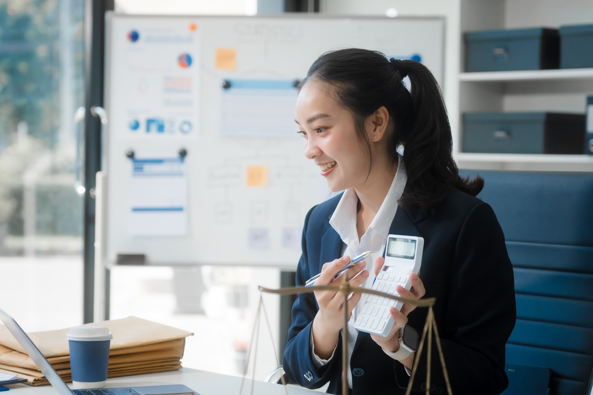 young female lawyer reviewing legal documentation