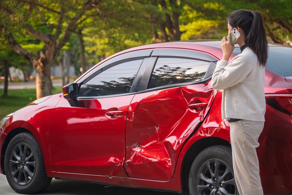 Car accident.Young Asian woman after car accident.